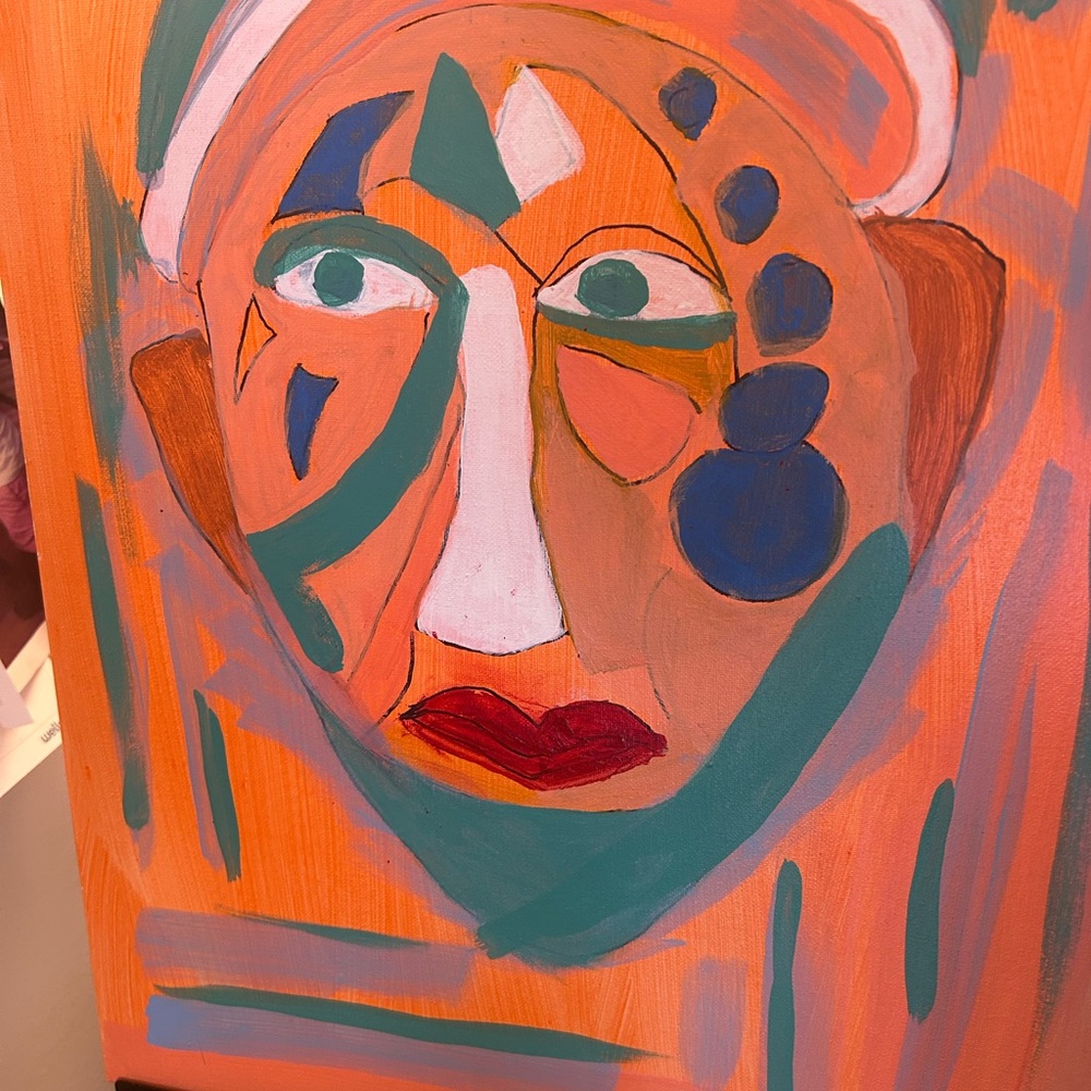 Vibrant Abstract Face Canvas with Orange and Blue Accentsnurse